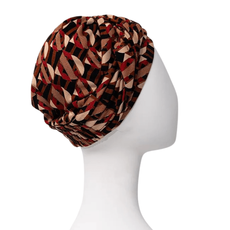 Sapphire Boho Turban im Tribal Art Muster, von rechts auf einer weißen Schaufensterpuppe