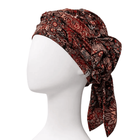 Juvela Turban Floral Folklore auf Schaufensterpuppe, seitlich mit gedrehter Blumendetail
