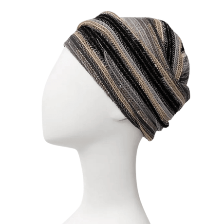 Zoya Turban im Black Autumn Stripes Muster mit integriertem Haarband auf weißer Schaufensterpuppe, Seitenansicht