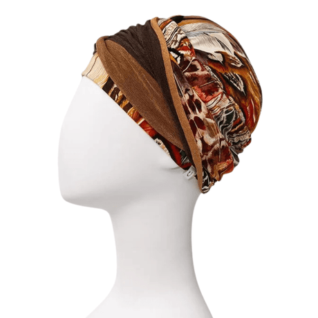 Shakti Turban - Tribal Feathers auf Schaufensterpuppe von rechts mit Federprint und Stirnband