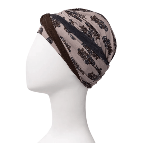 Shakti Turban in Beige mit dunklem Paisley-Muster, Seitenansicht auf Schaufensterpuppe, Stirnband im Nacken